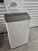 Front view of Danby portable air conditioner showing brand and control panel