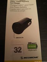 Front of retail box showing charger image and 20W rating