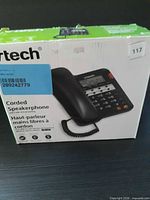 Front of VTech retail box showing image of corded speakerphone
