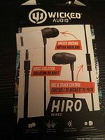 Front of retail box showing Wicked Audio Hiro headphones and features
