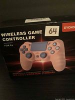 Front of retail box showing Dyonder wireless game controller image and key features