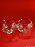 Front view of both Corn Flower etched glass pieces