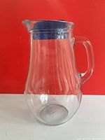 Full view of pitcher assembled with lid showing overall form