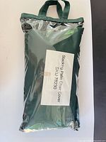 Front view of packaged stacking patio chair cover
