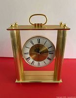 Front view of gold-tone Seiko mantel clock