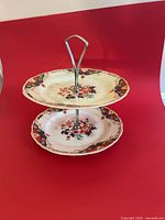 Assembled two-tier porcelain stand front view