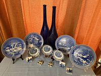 Full lot overview showing plates, vases, small plates, tiles and clogs
