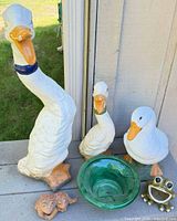 group view of three geese, planter bowl, frog figurines