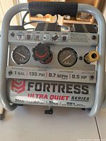 Front control panel showing gauges, branding and specifications