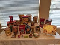 Full group of tins and tray on table