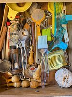 Drawer view showing full assortment of utensils