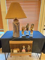 Overall lot showing lamp, figurines and hanging