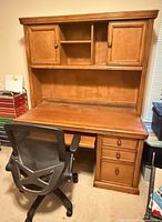 Desk with hutch and office chair in front view
