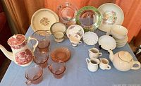 overview of entire mixed dinnerware set on table