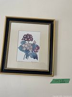 Full view of framed botanical print on wall