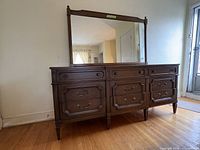 Front view of dresser with attached mirror