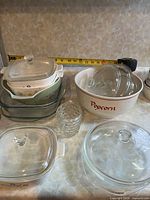 Overall group of casseroles, bowl, lids and tumbler