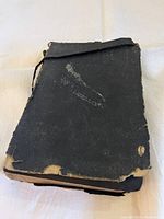 Detached front cover with heavy edge wear