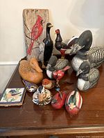 group shot of all bird figures on table