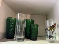 All five glasses on shelf