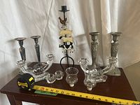 Group view of all candleholders on table