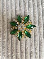 Front view showing green marquise and clear round rhinestones