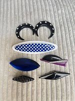 All seven plastic accessories arranged together