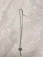 Full view of necklace showing chain length and pendant