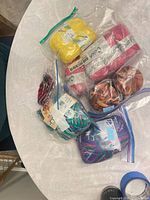 Overview of all bagged skeins on table