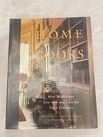 Front view of the dust-jacketed hardcover At Home with Books