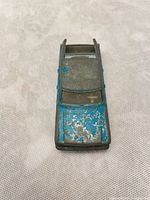 Top view showing blue paint loss and roof detail