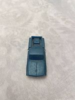 Top view of small blue plastic pickup toy