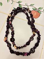 Necklace doubled showing bead variety and colors
