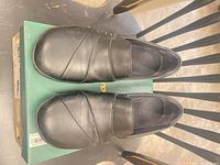 Top view of both shoes on box