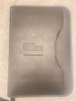 Front view of black Gemline padfolio showing "Catch Des Moines" imprint