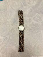 Full view of Geneva watch, leopard print nylon band