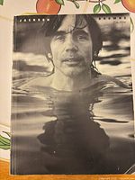 Front cover of songbook showing title and artist