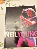 Front cover showing title, author, photo of Neil Young