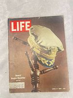 Front cover showing Life logo, MacArthur cap image, date and price