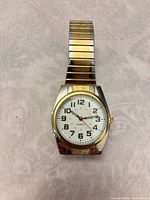 Front view of wristwatch showing dial, bezel, and band