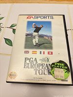 Front of Sega Genesis PGA European Tour case with cartridge inside