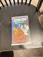 Front view of VHS showing illustrated cover art and clamshell case