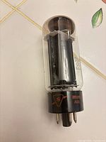 Full view of Sylvania 5U4GB vacuum tube, glass envelope and base markings visible