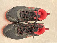 Top view of both cleats showing overall condition, laces, color scheme