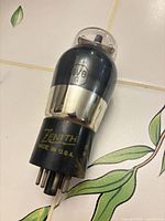 Side view showing Zenith logo, model and glass envelope