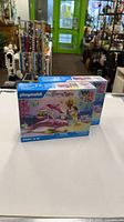 Front view of both sealed Playmobil Dolphin Spa sets
