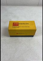 Closed Kodak projection lens box