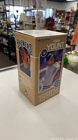 Front corner of boxed Robin Yount bobblehead showing Brewers graphics