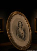 Angled view showing portrait and frame detail