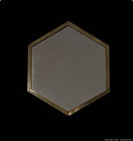 Front view of hexagonal brass framed mirror